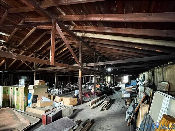 a kitchen with stainless steel appliances granite countertop a sink a stove and a refrigerator with cabinets