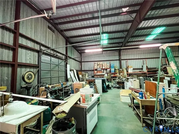 a bathroom with a toilet tub and shower
