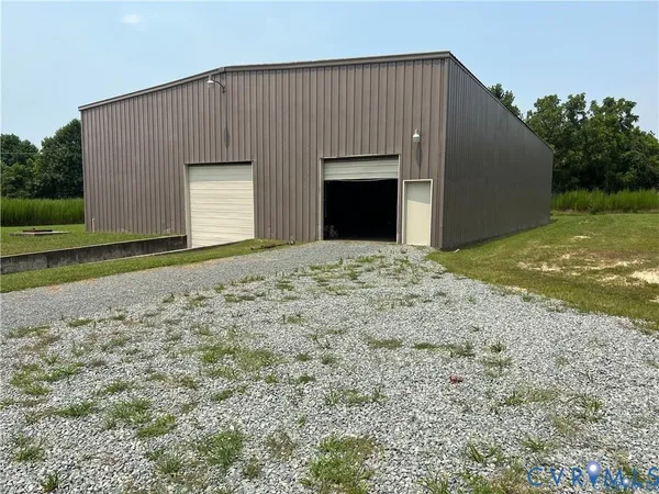 a view of parking garage with cars