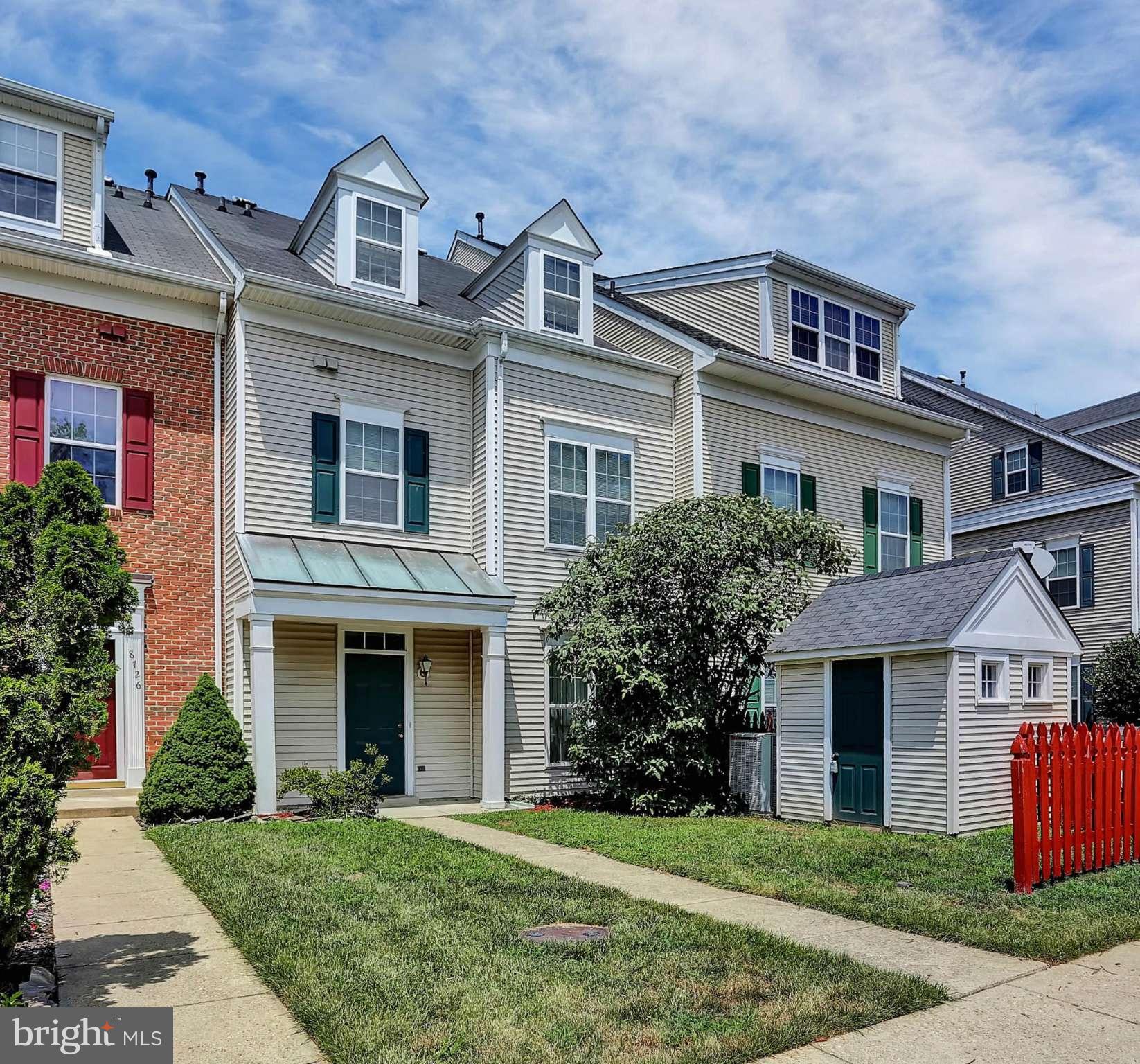 8724 Autumn Ridge Court Odenton, MD 21113 - Photo 1 of 24 front view of a house with a yard