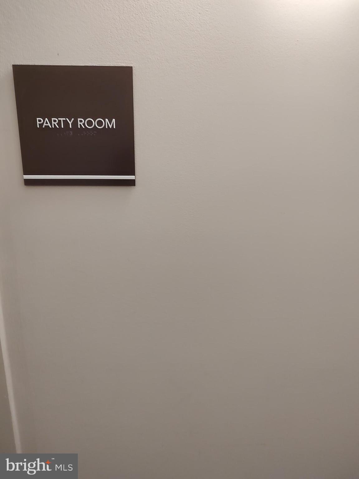 1111 University Boulevard West, Unit 719A Silver Spring, MD 20902 - Photo 24 of 41 a view of a wall with a sign on it