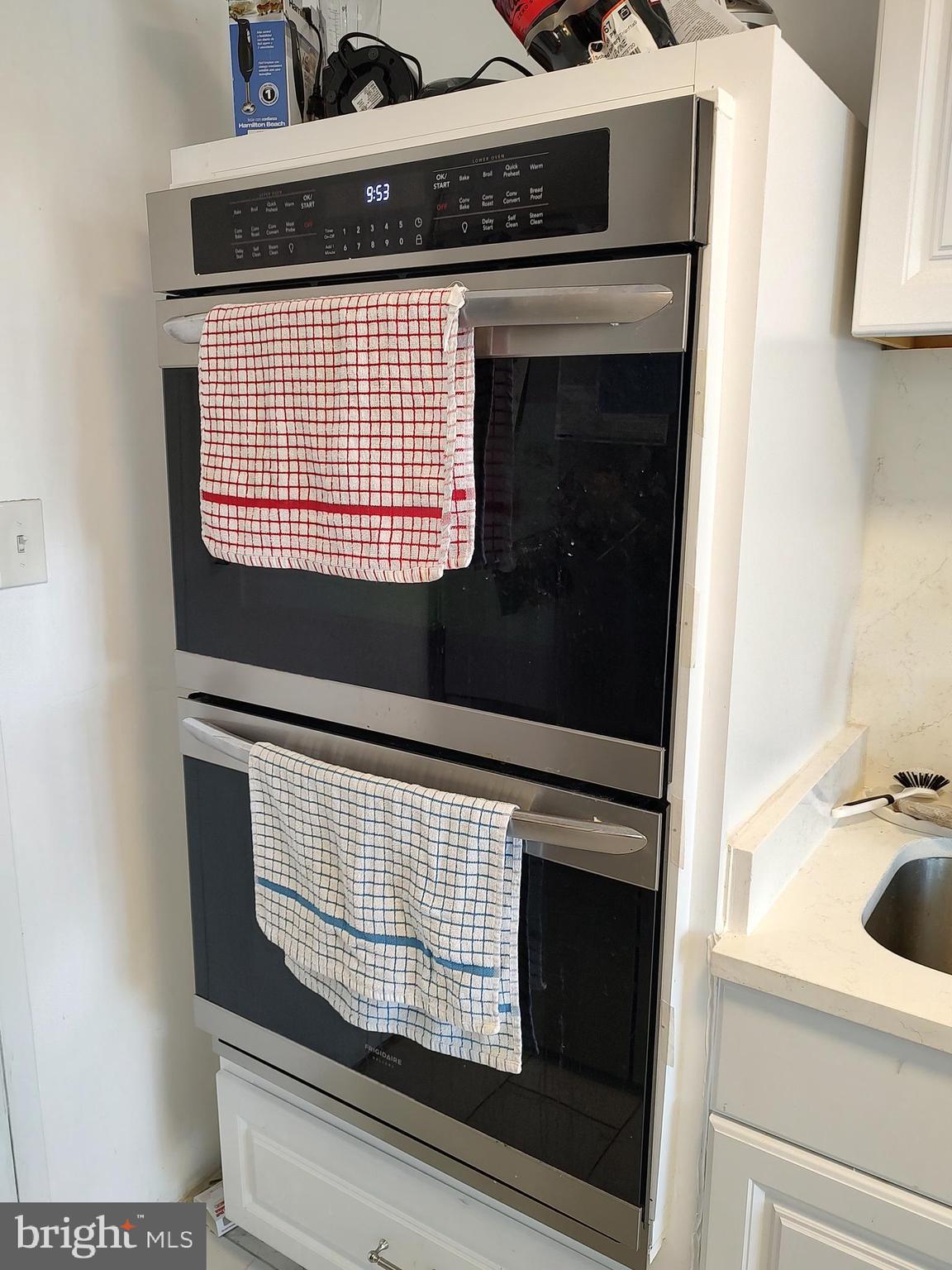 1111 University Boulevard West, Unit 719A Silver Spring, MD 20902 - Photo 10 of 41 a view of washer and dryer
