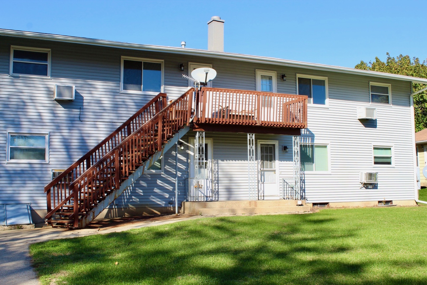 321 South Avenue, Unit C Hampshire, IL 60140 - Photo 11 of 15 a view of front of house with a yard