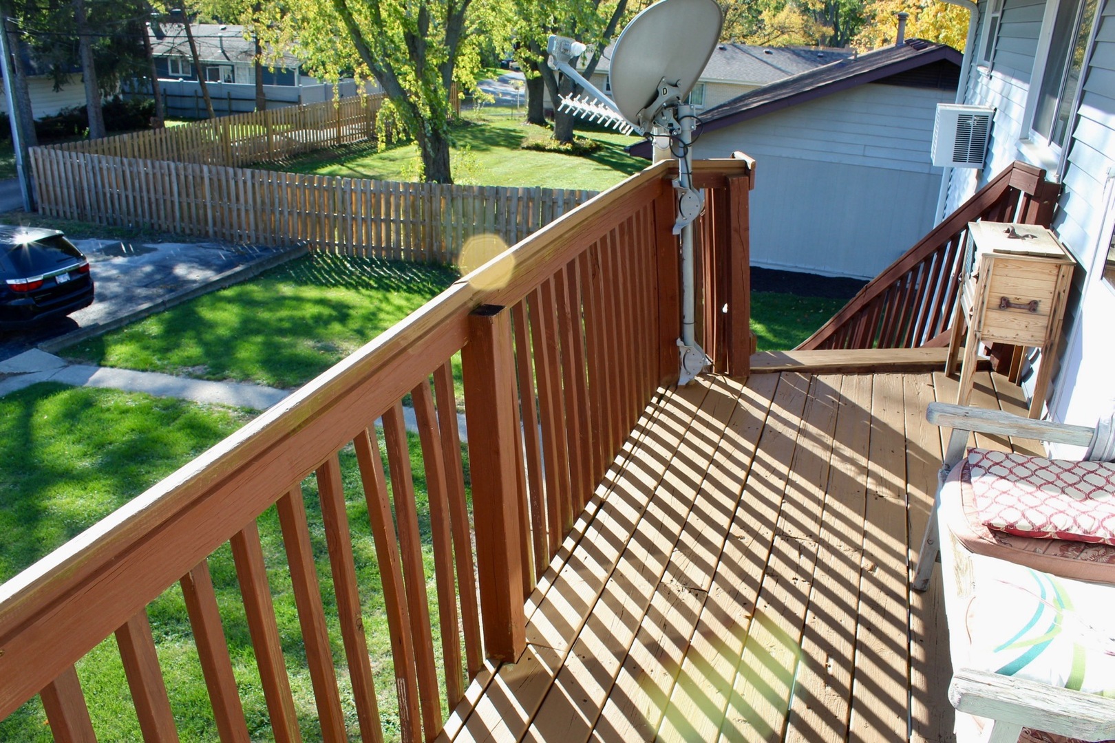 321 South Avenue, Unit C Hampshire, IL 60140 - Photo 12 of 15 a balcony with wooden floor