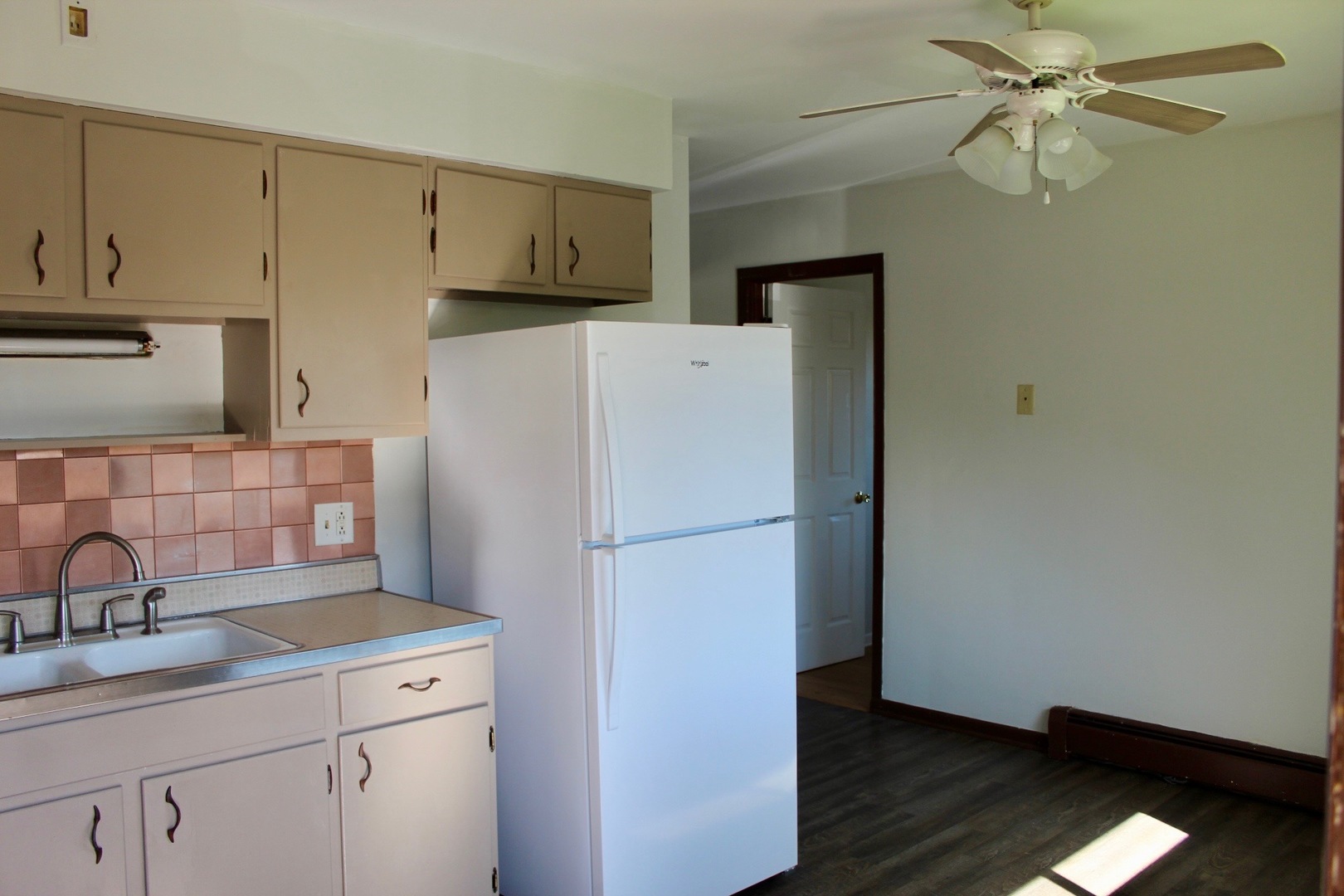 321 South Avenue, Unit C Hampshire, IL 60140 - Photo 7 of 15 a white refrigerator freezer sitting in a kitchen