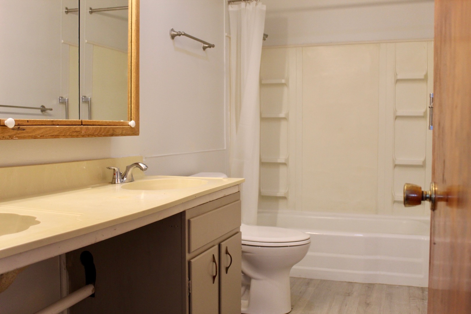 321 South Avenue, Unit C Hampshire, IL 60140 - Photo 9 of 15 a bathroom with a sink a toilet and shower