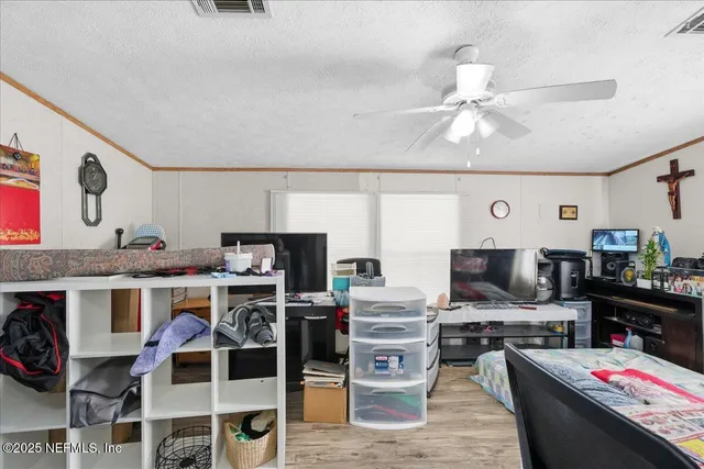 a kitchen with stainless steel appliances kitchen island granite countertop a sink and cabinets