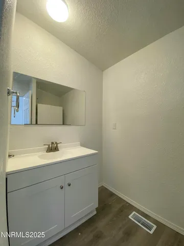 a balcony view with a flat screen tv