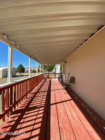 a view of a terrace with a lake view