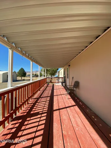a view of a terrace with a lake view