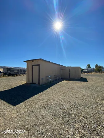 a view of a parking space and a building