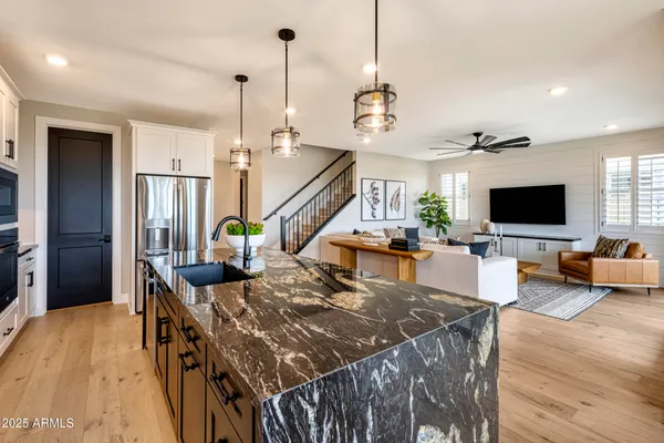 a view of a living room and a flat screen tv