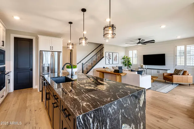 a view of a living room and a flat screen tv