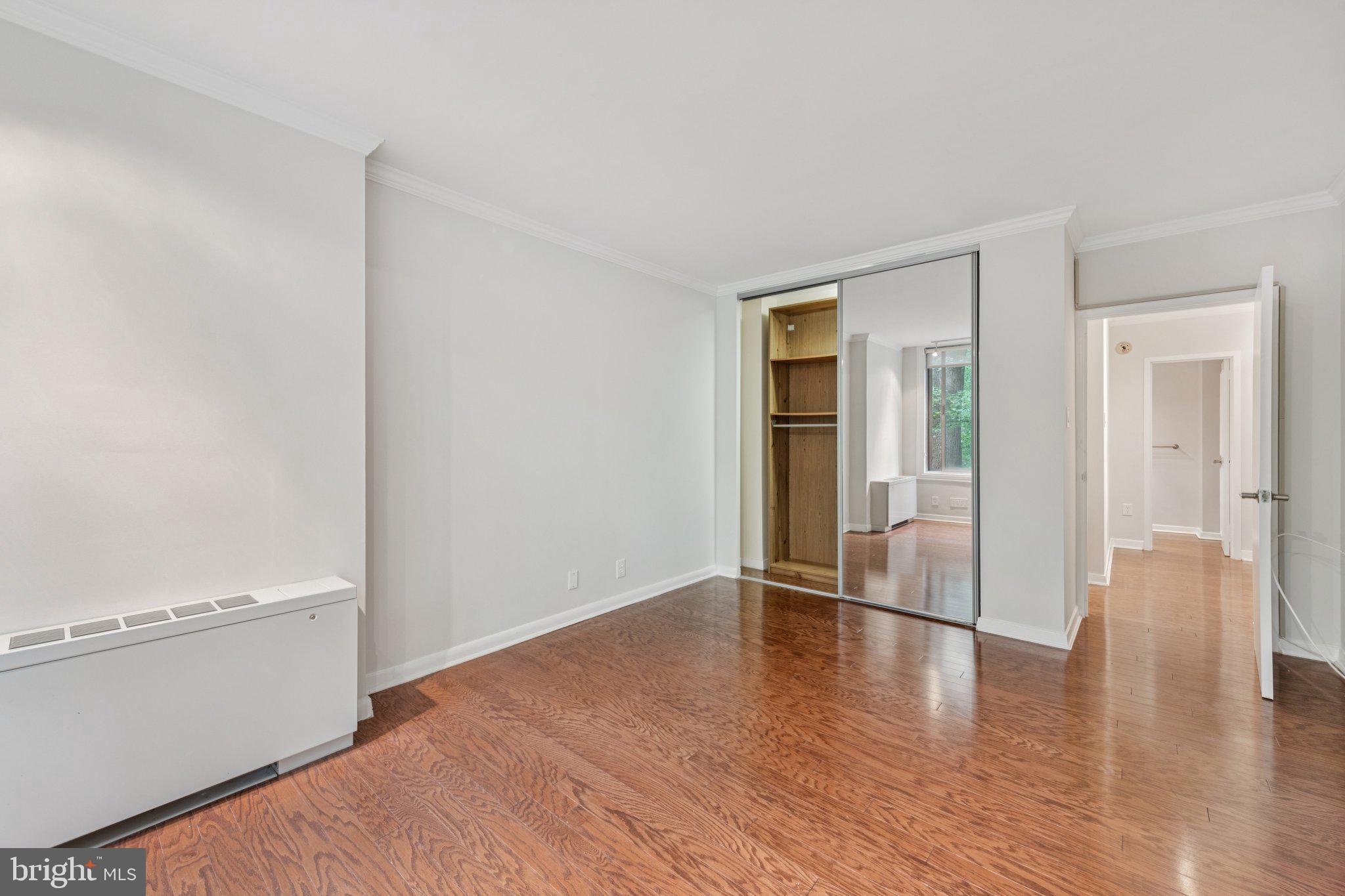 4100 Cathedral Avenue Northwest, Unit 406 Washington, DC 20016 - Photo 16 of 30 a view of livingroom with hardwood floor and hallway