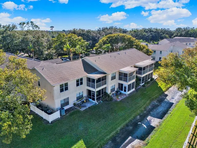 an aerial view of a house with a garden