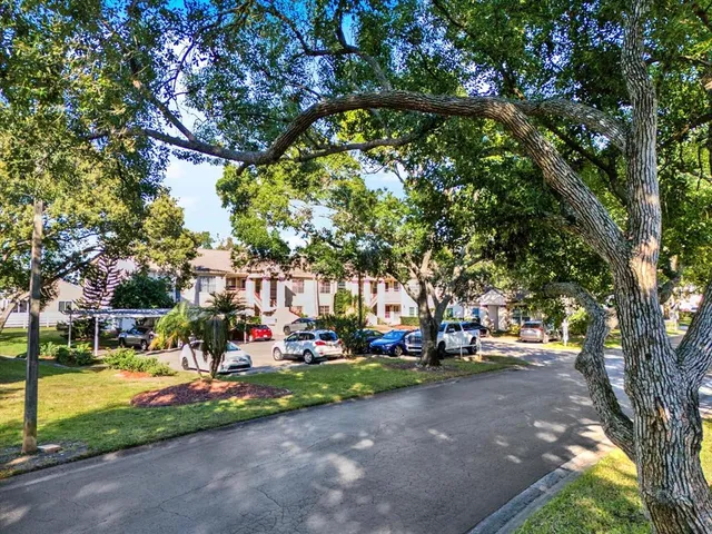 a childrens park with lots of swings and slides