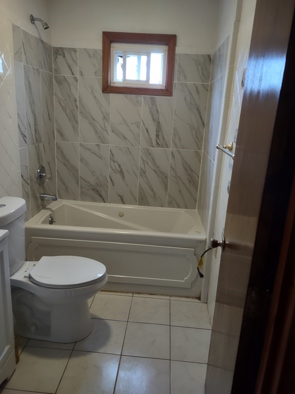112 Marlborough Street Springfield, MA 01109 - Photo 13 of 22 a bathroom with a toilet and a shower