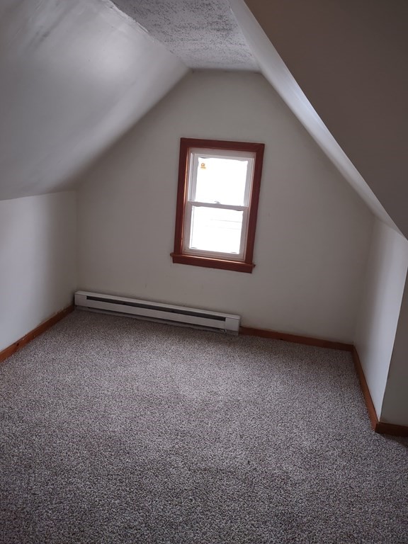 112 Marlborough Street Springfield, MA 01109 - Photo 17 of 22 a view of an empty room with a window