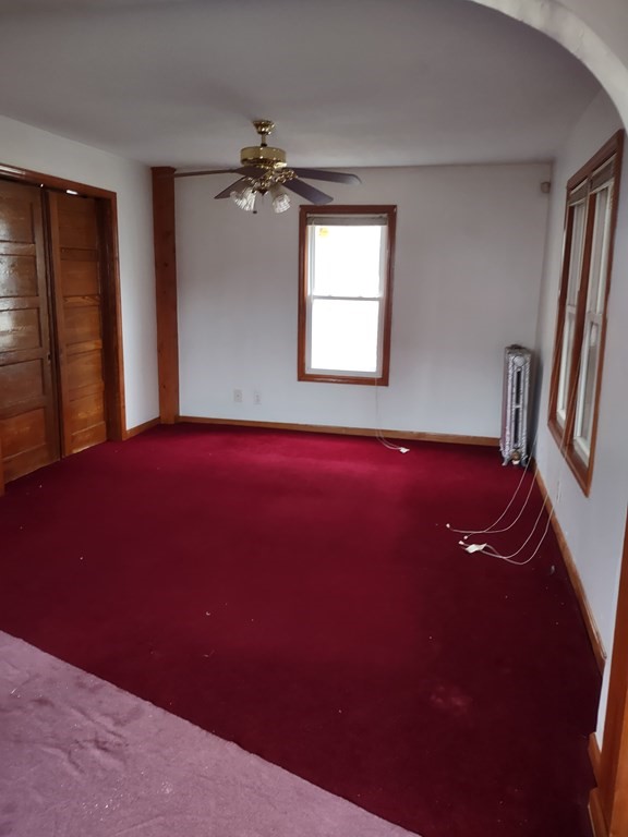 112 Marlborough Street Springfield, MA 01109 - Photo 2 of 22 a view of furniture and window in an empty room