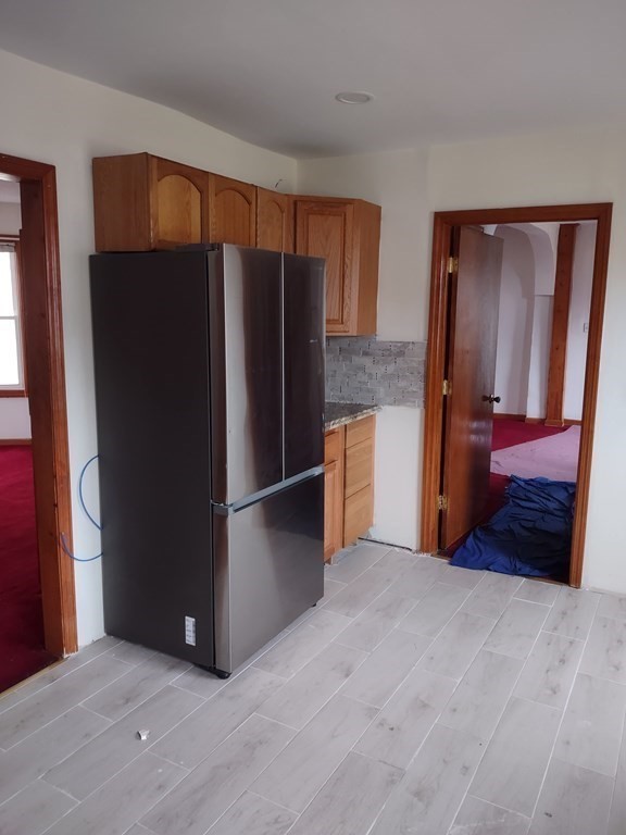 112 Marlborough Street Springfield, MA 01109 - Photo 7 of 22 a view of kitchen with refrigerator and cabinet