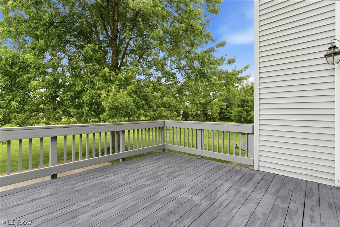 11678 Dunham Road Northfield, OH 44067 - Photo 31 of 38 Spacious outdoor deck with gray wood-finish flooring and matching railings