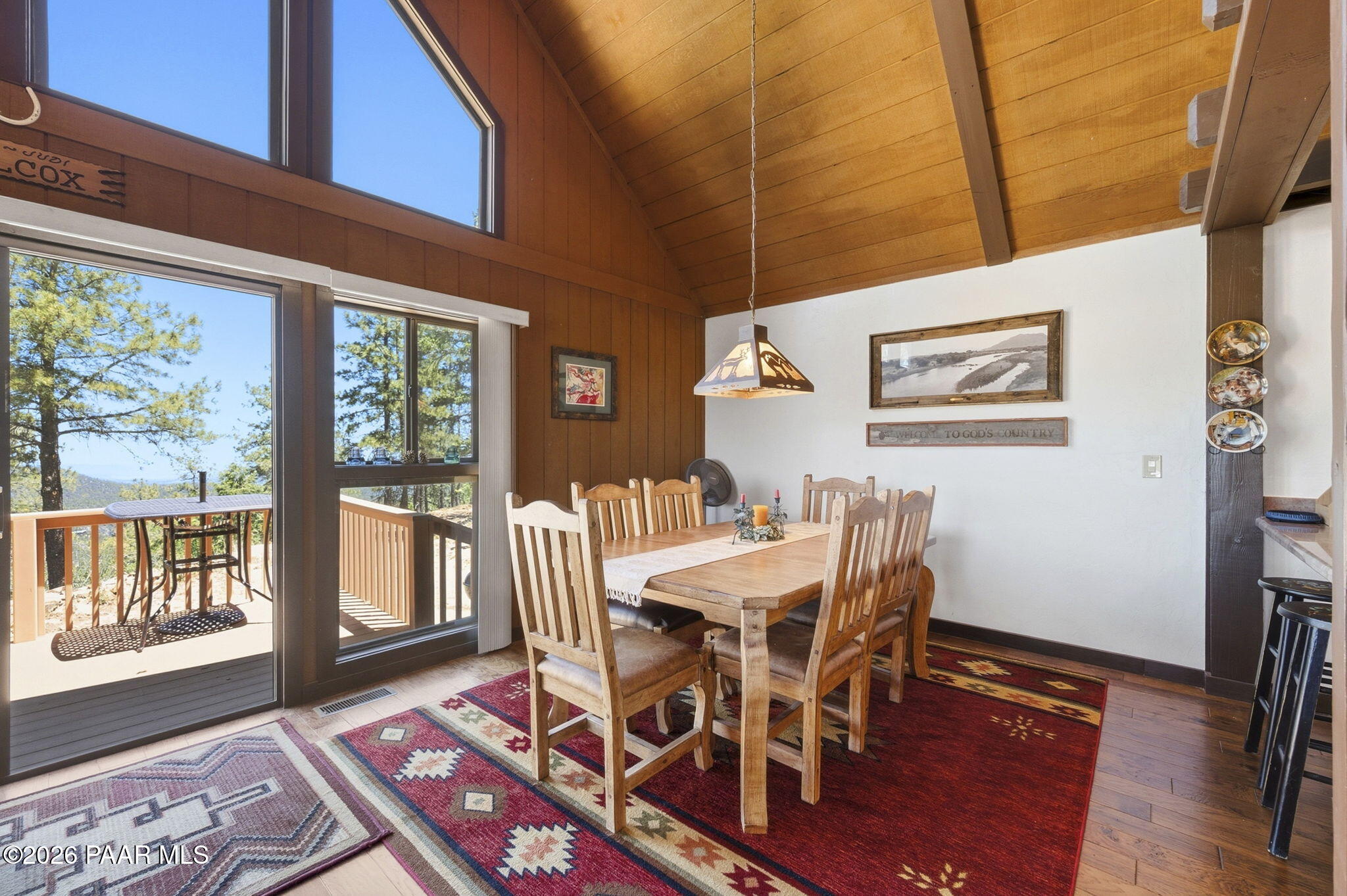 7251 South Big Bug Mesa Road Mayer, AZ 86333 - Photo 22 of 55 a view of a dining room with furniture window and wooden floor