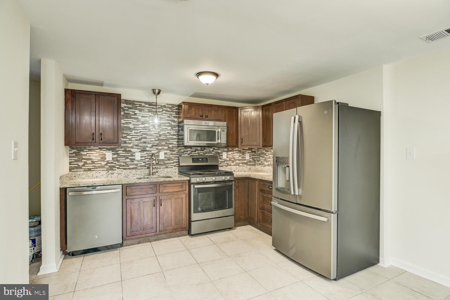 1809 Palmer Park Road Landover, MD 20785 - Photo 12 of 45 Remodeled Kitchen and Dining Room
