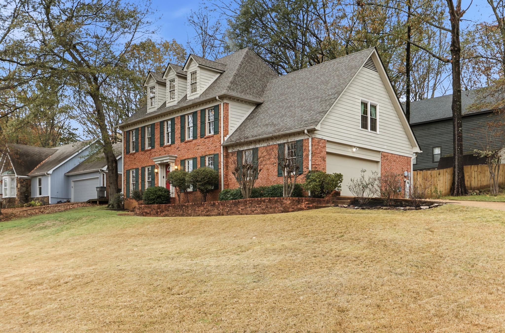 8372 Bazemore Road Cordova, TN 38018 - Photo 2 of 40 a front view of a house with a yard