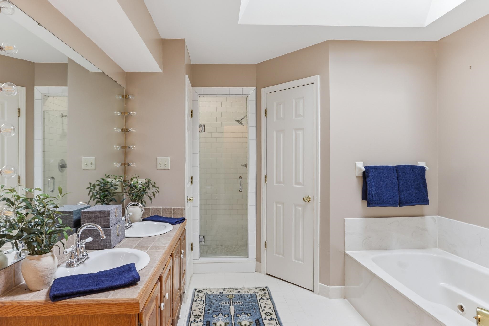 8372 Bazemore Road Cordova, TN 38018 - Photo 21 of 40 a living room with furniture and a potted plant