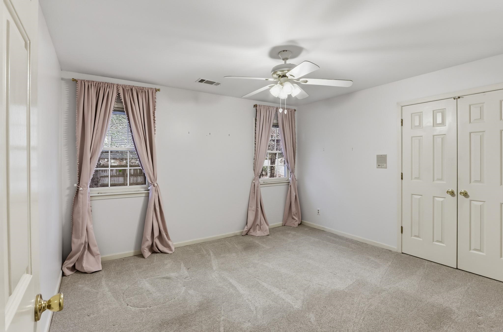 8372 Bazemore Road Cordova, TN 38018 - Photo 25 of 40 an empty room with windows