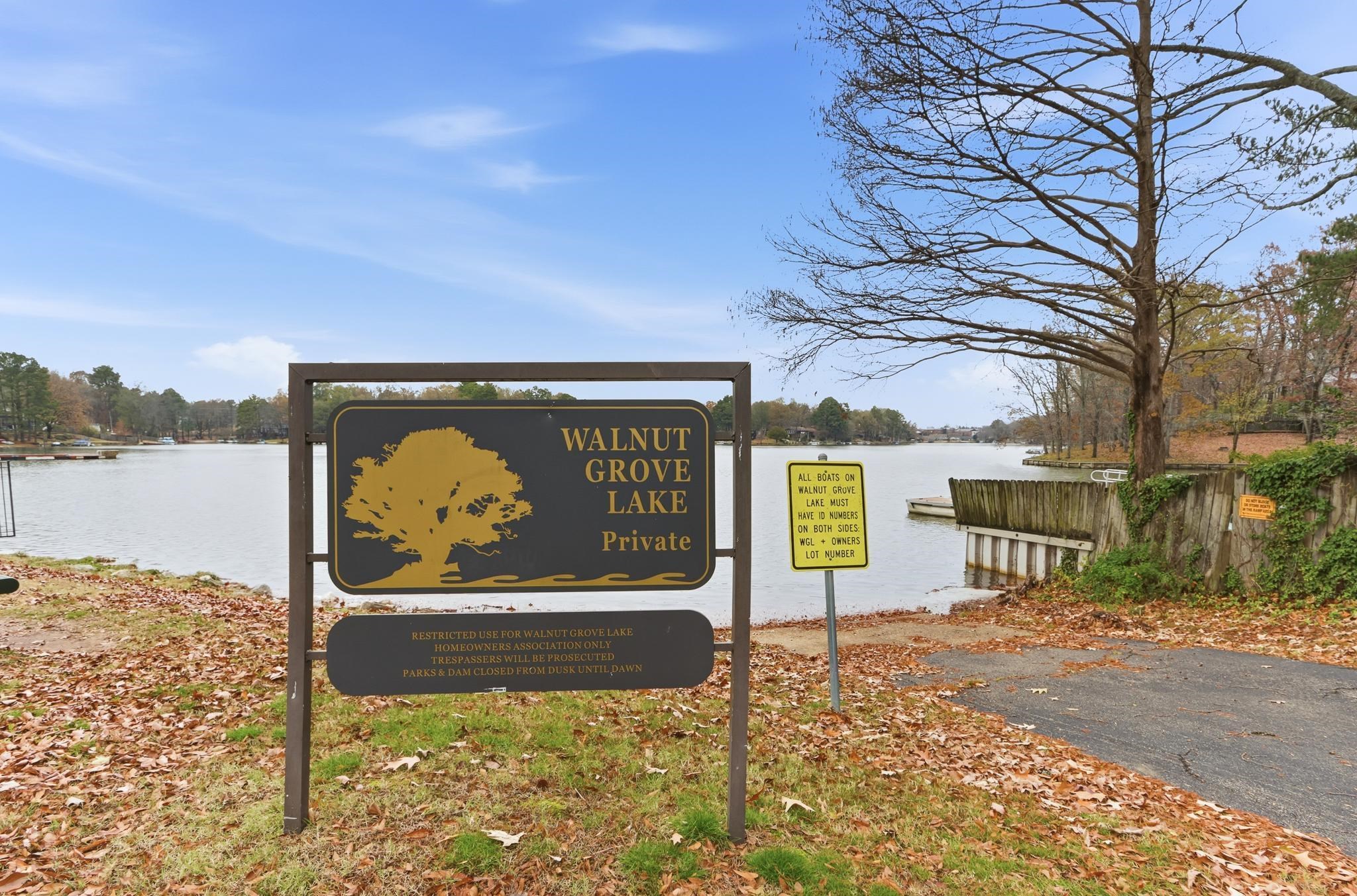 8372 Bazemore Road Cordova, TN 38018 - Photo 36 of 40 a sign on the side of the road