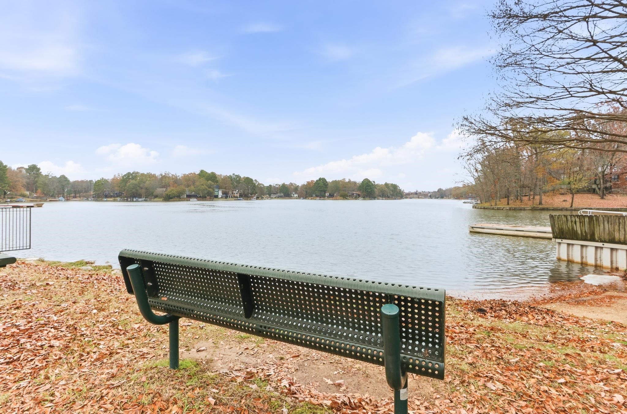8372 Bazemore Road Cordova, TN 38018 - Photo 37 of 40 a view of lake with a table and chairs