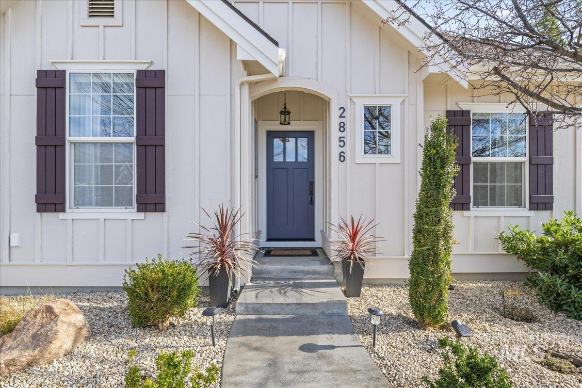 2856 South Wise Way Boise, ID 83716 - Photo 4 of 47 View of exterior entry featuring board and batten siding