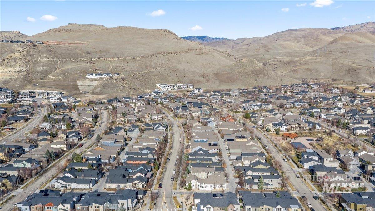 2856 South Wise Way Boise, ID 83716 - Photo 44 of 47 Aerial overview of property's location featuring nearby suburban area and a mountainous background