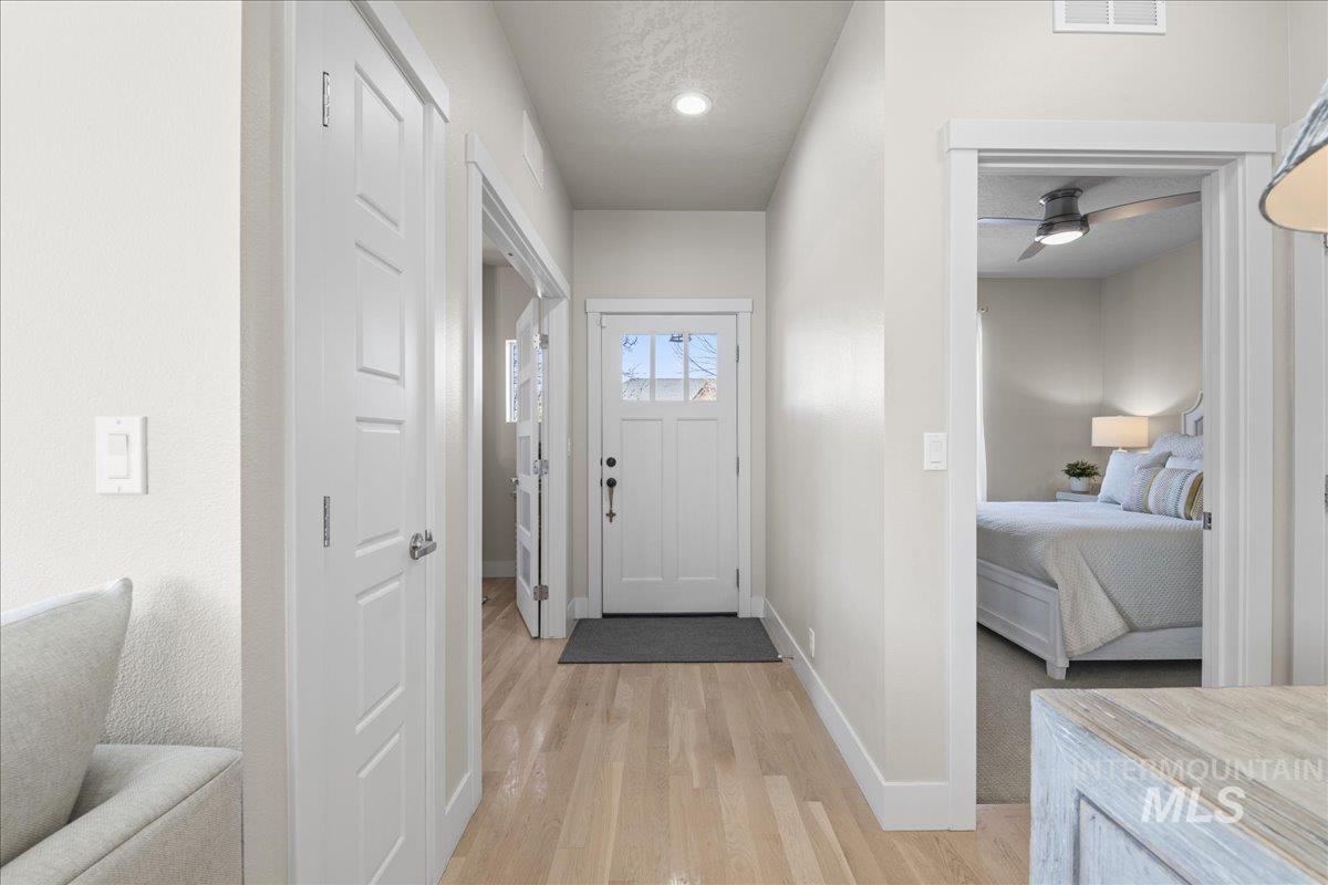 2856 South Wise Way Boise, ID 83716 - Photo 5 of 47 Doorway to outside with wood finished floors, ceiling fan, and recessed lighting
