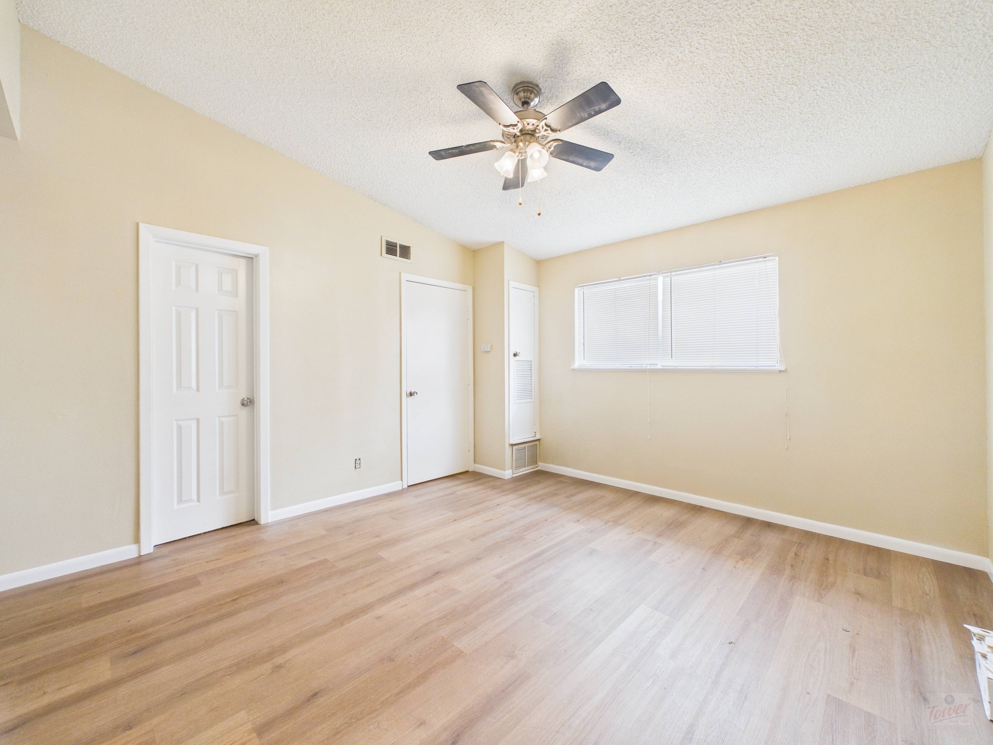 616 West 51st Street, Unit 101 Austin, TX 78751 - Photo 11 of 16 a view of an empty room with wooden floor