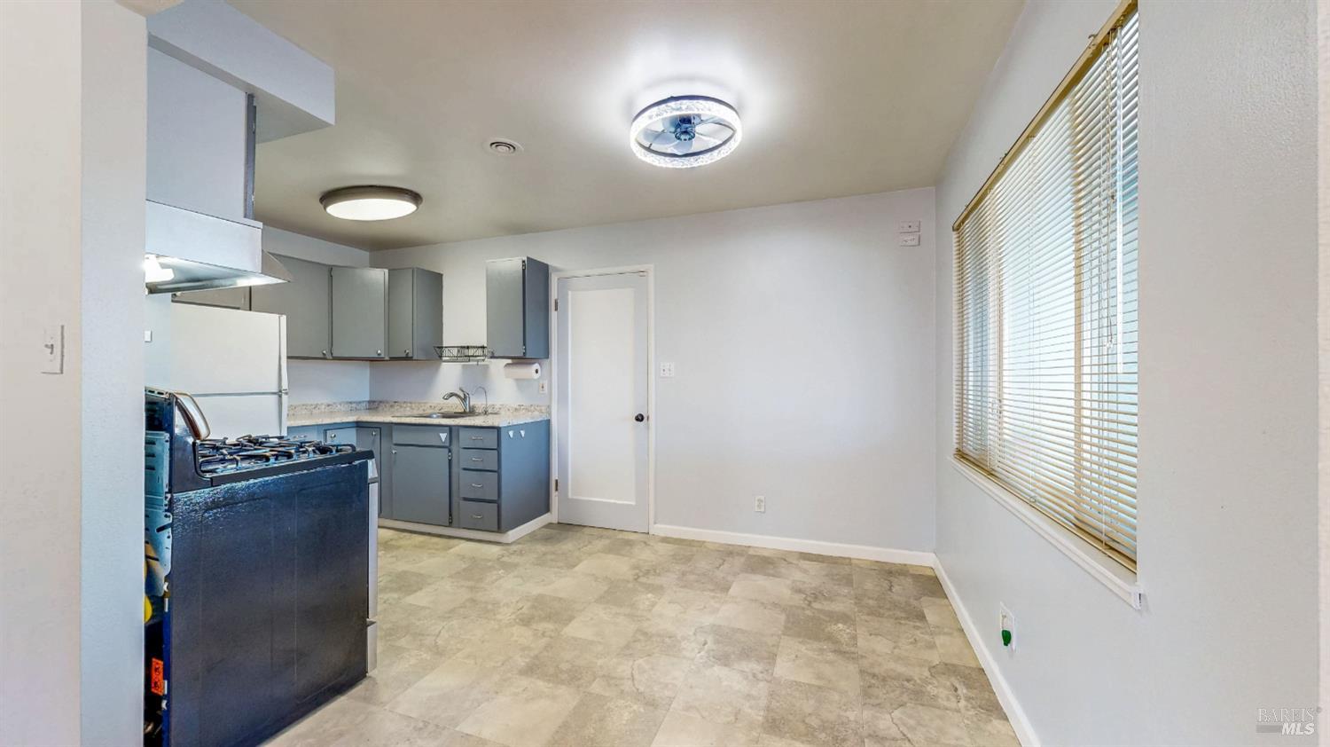809 Maple Avenue Vallejo, CA 94591 - Photo 15 of 46 a large kitchen with a stove a sink dishwasher and a refrigerator