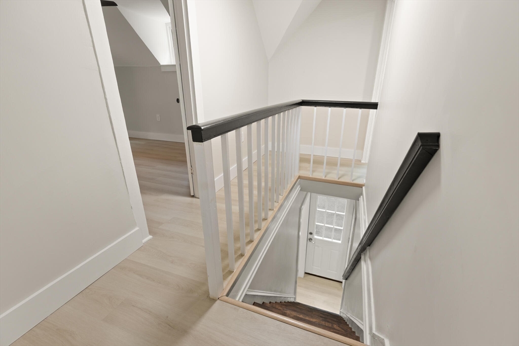 25 Norfolk Street Canton, MA 02021 - Photo 18 of 31 a view of staircase with white walls and railing