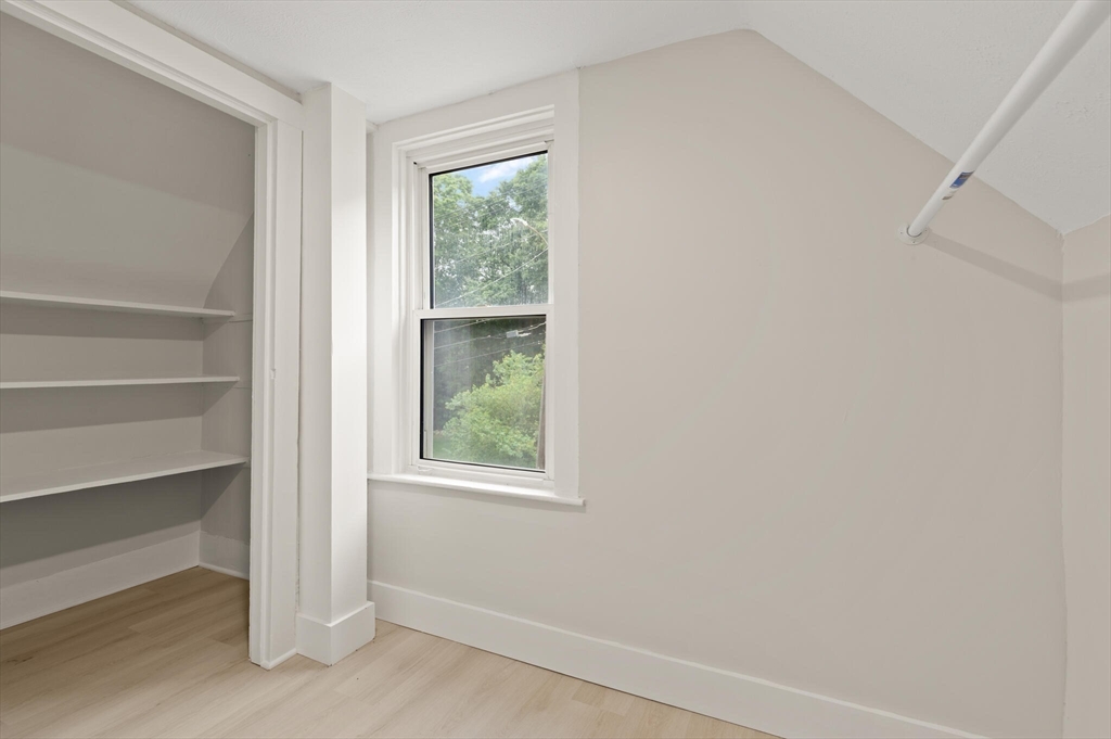 25 Norfolk Street Canton, MA 02021 - Photo 21 of 31 a view of an empty room with a window