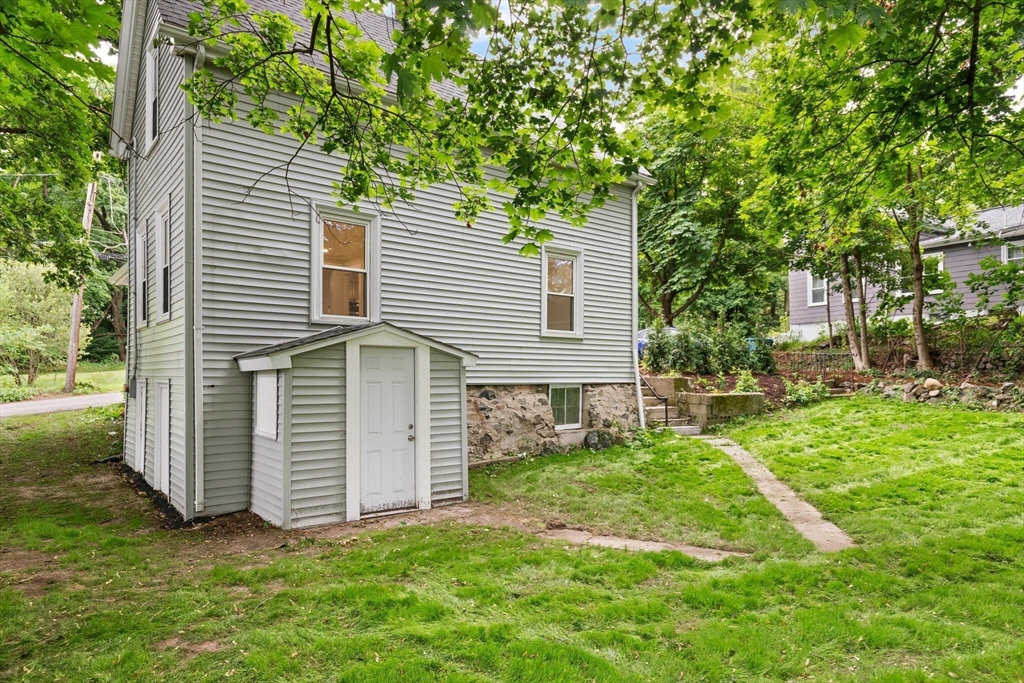 25 Norfolk Street Canton, MA 02021 - Photo 26 of 31 front view of a house with a yard