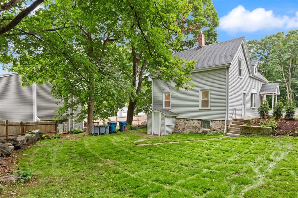 25 Norfolk Street Canton, MA 02021 - Photo 27 of 31 a view of a house with backyard and a tree