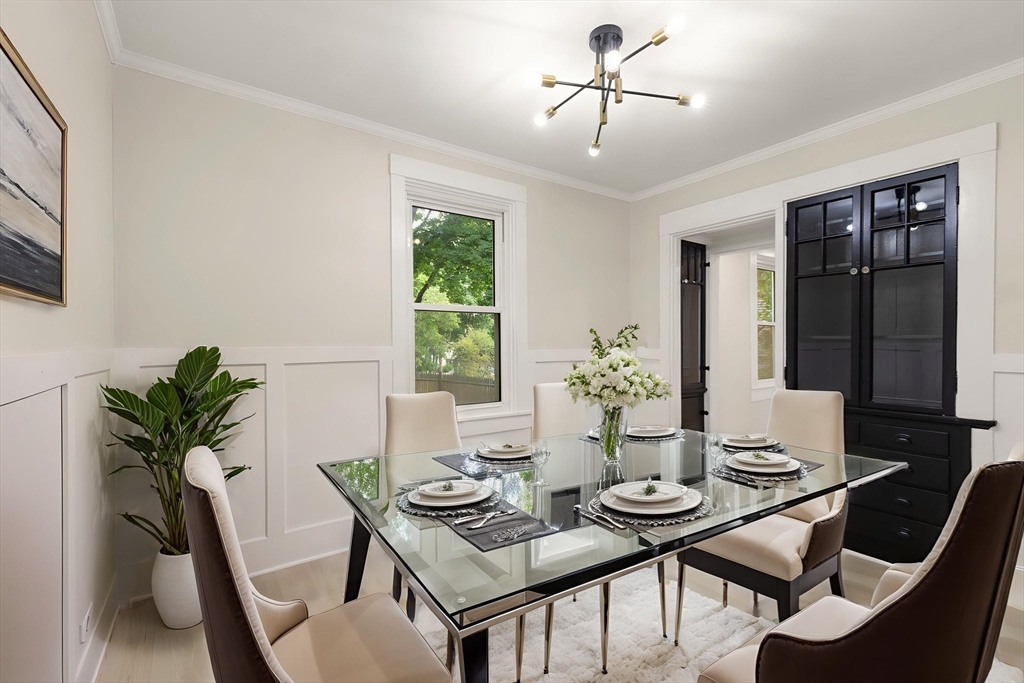 25 Norfolk Street Canton, MA 02021 - Photo 3 of 31 a view of a dining room with furniture window and wooden floor