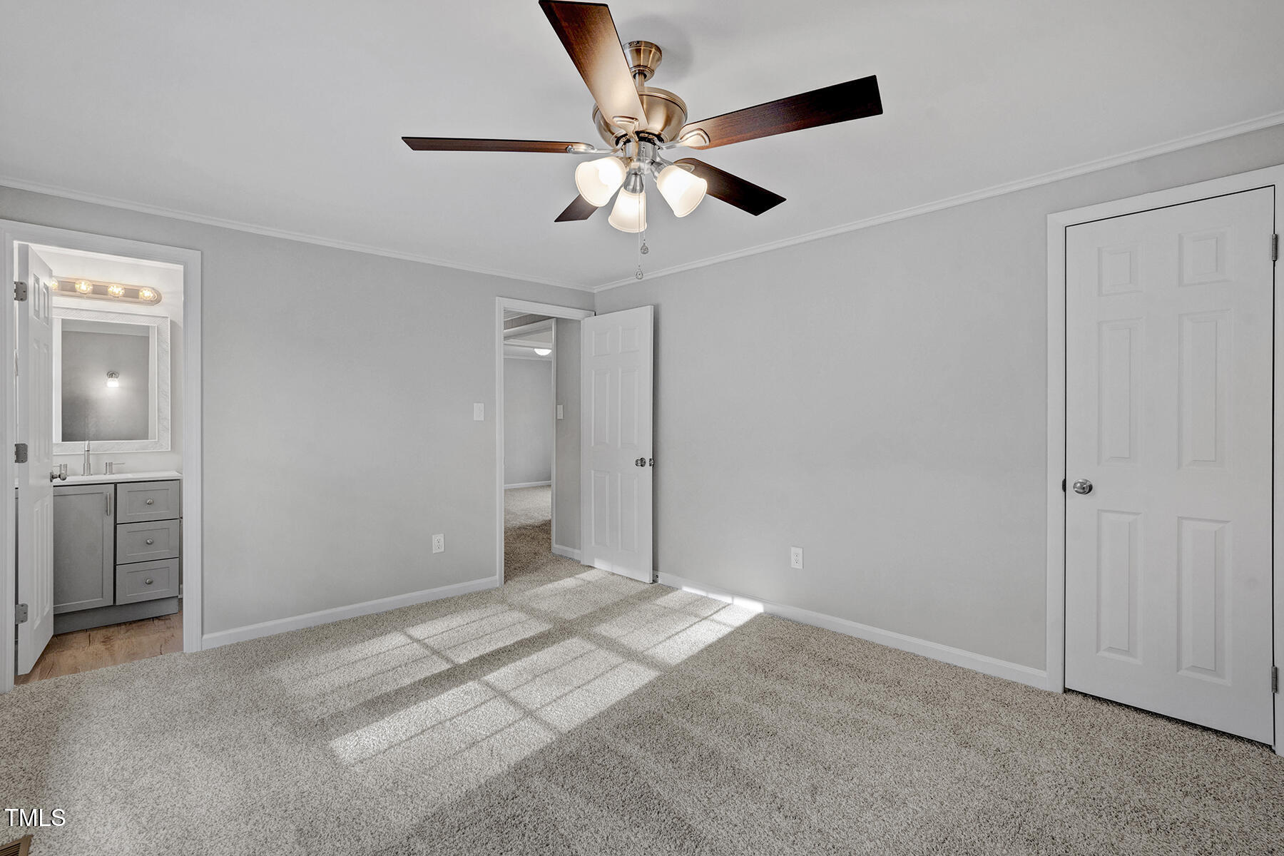 7516 Fox Road Raleigh, NC 27616 - Photo 21 of 31 a view of a livingroom with a ceiling fan and a ceiling fan