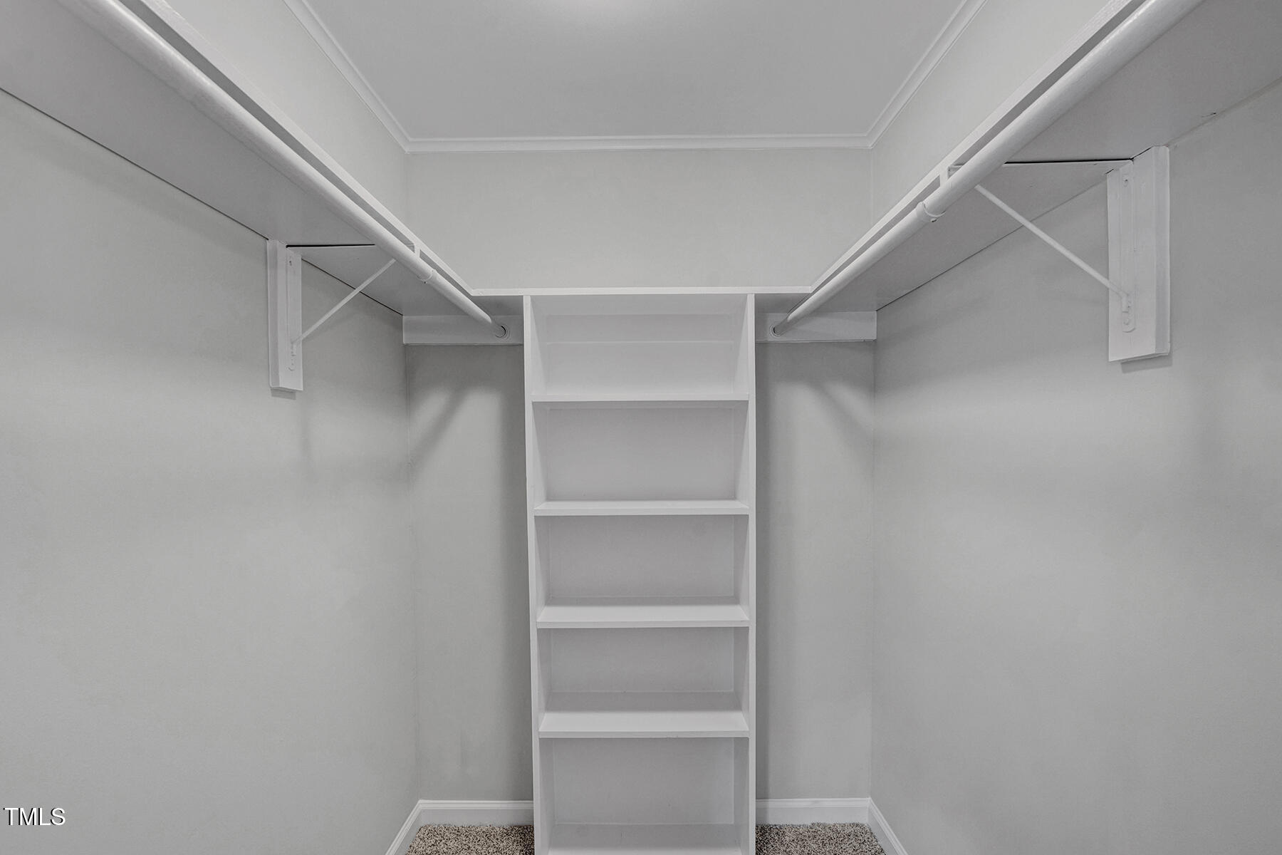 7516 Fox Road Raleigh, NC 27616 - Photo 22 of 31 a view of an empty walk in closet