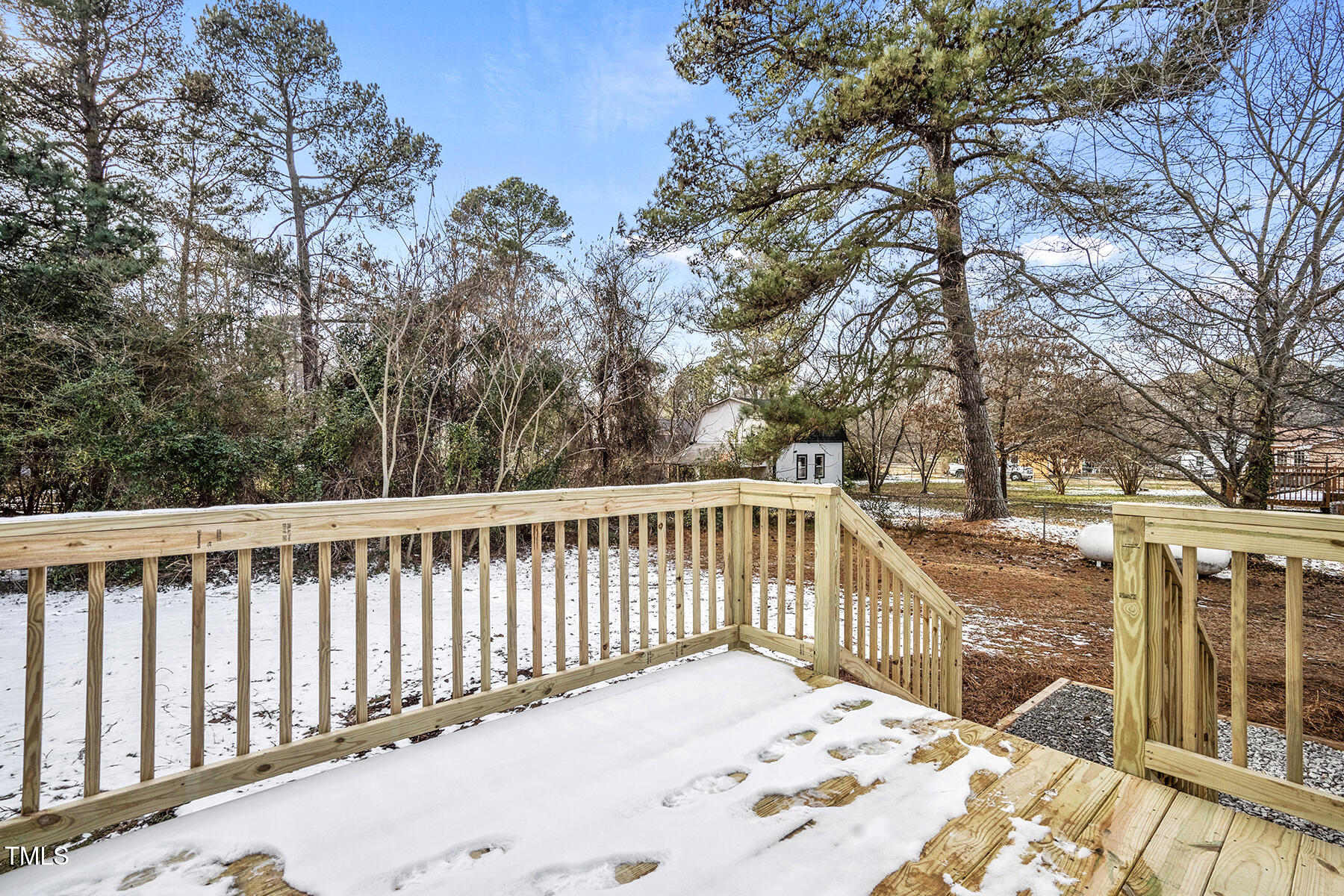 7516 Fox Road Raleigh, NC 27616 - Photo 24 of 31 a view of a wooden roof deck