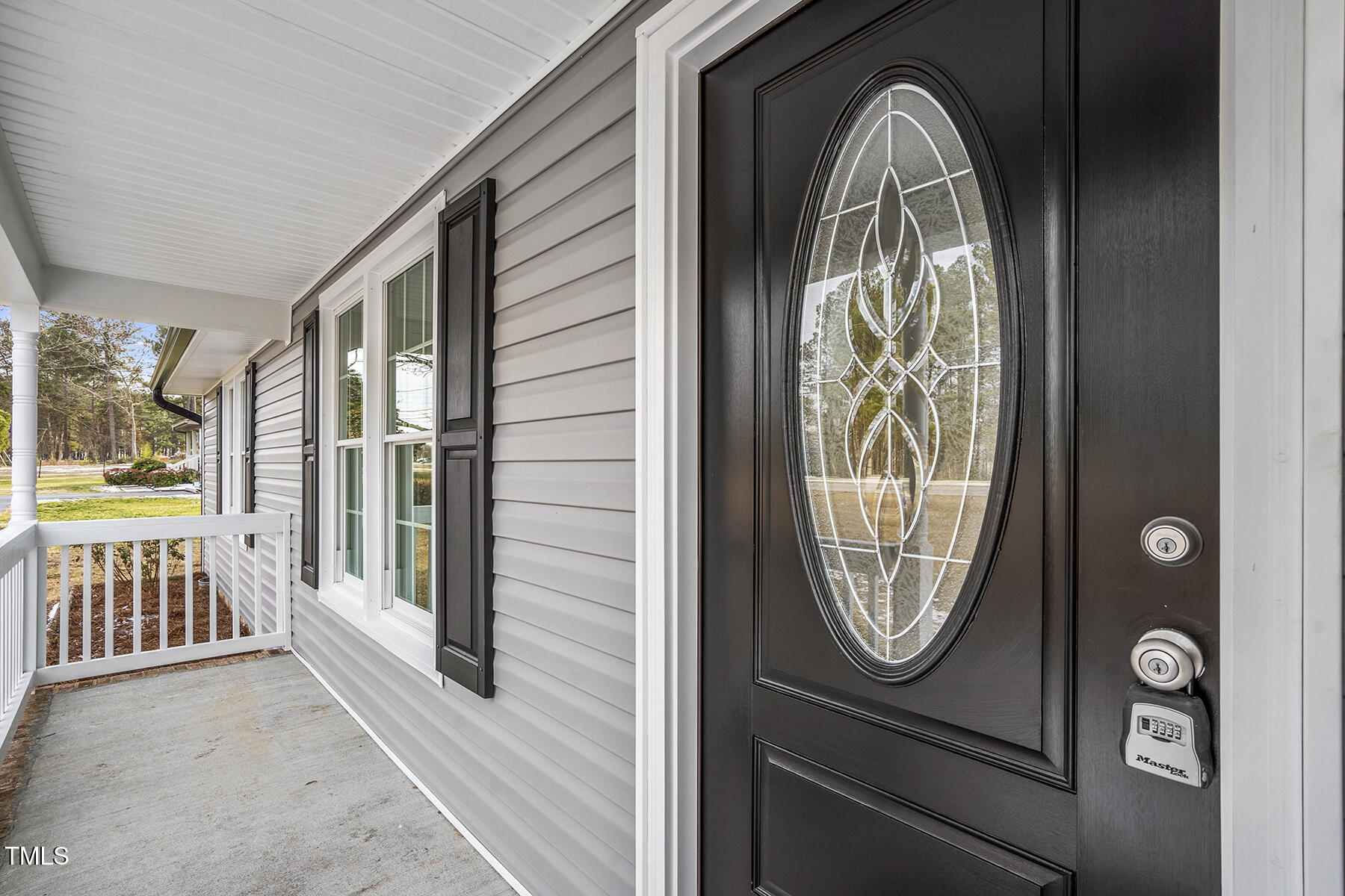 7516 Fox Road Raleigh, NC 27616 - Photo 4 of 31 a view of an entryway with a door