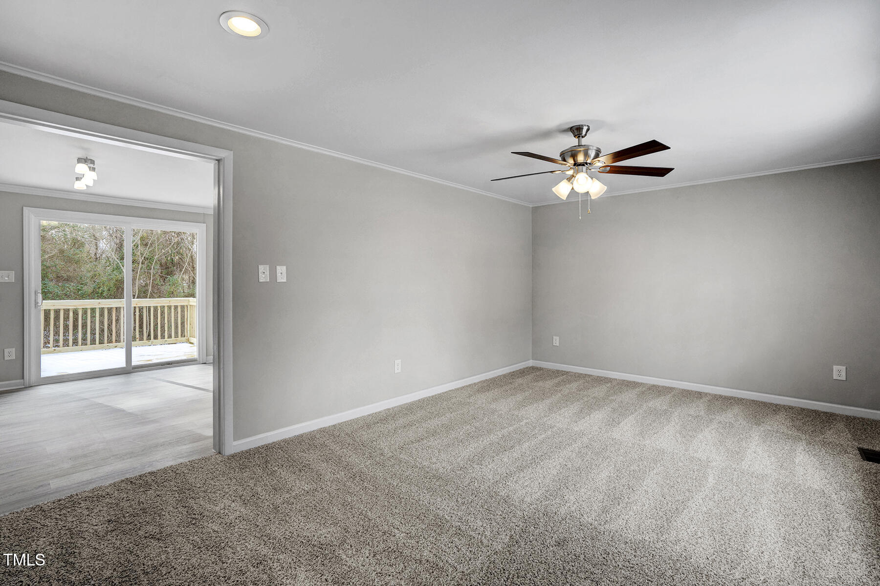 7516 Fox Road Raleigh, NC 27616 - Photo 5 of 31 a view of an empty room with a window