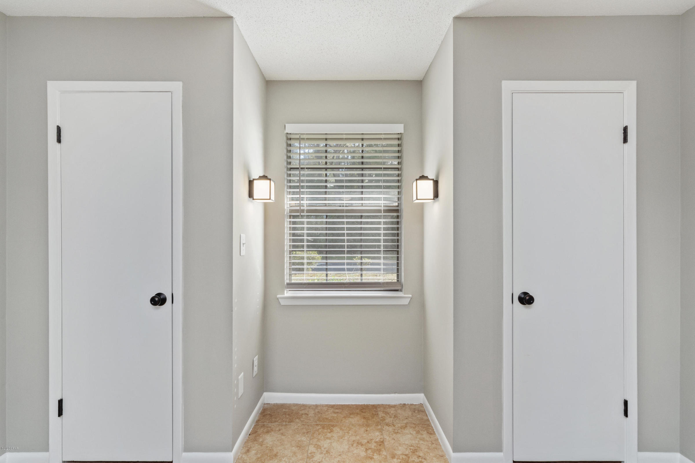 3057 Auburn Road Crestview, FL 32539 - Photo 23 of 30 a view of bathroom with closet and window