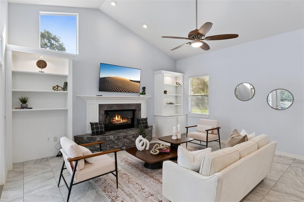 2125 Kane Park Way Windermere, FL 34786 - Photo 14 of 63 a living room with furniture and a fireplace