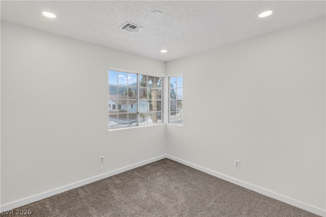 3156 Terrace View Drive Laughlin, NV 89029 - Photo 44 of 94 Well-lit room with ample window views, offering a comfortable and adaptable living space.